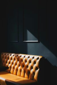 Tan couch in an office space