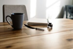 Cup and book on a desk