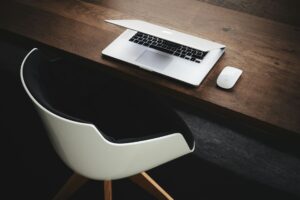 Chair set up next to a computer