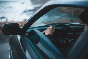 Person driving a car