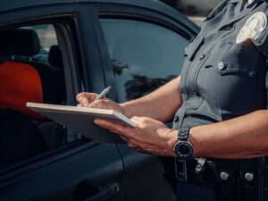 Person receiving a notice from a police officer
