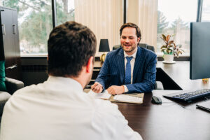 man at criminal defense attorney meeting with the chariot law colorado